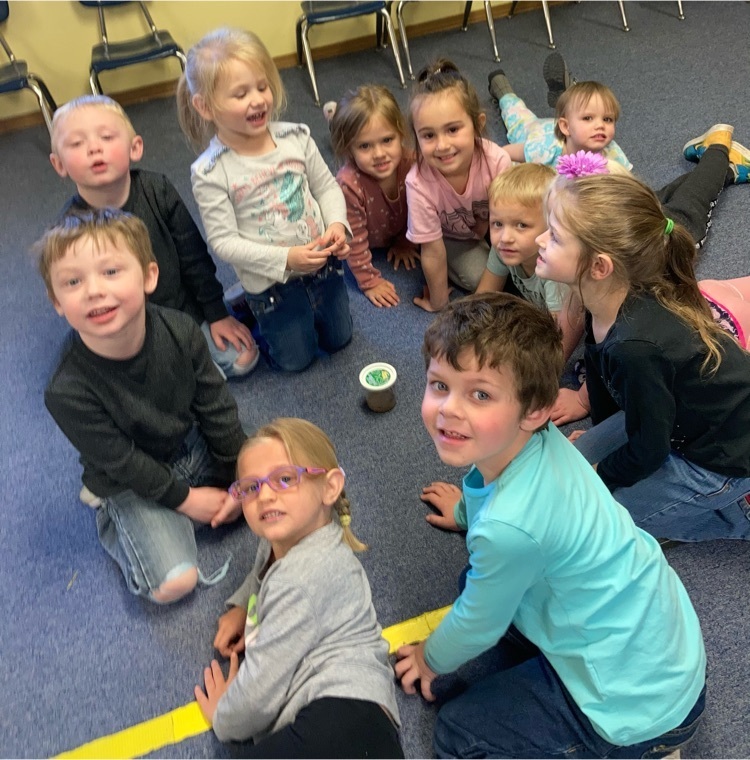Morning preschool class meeting our caterpillars.