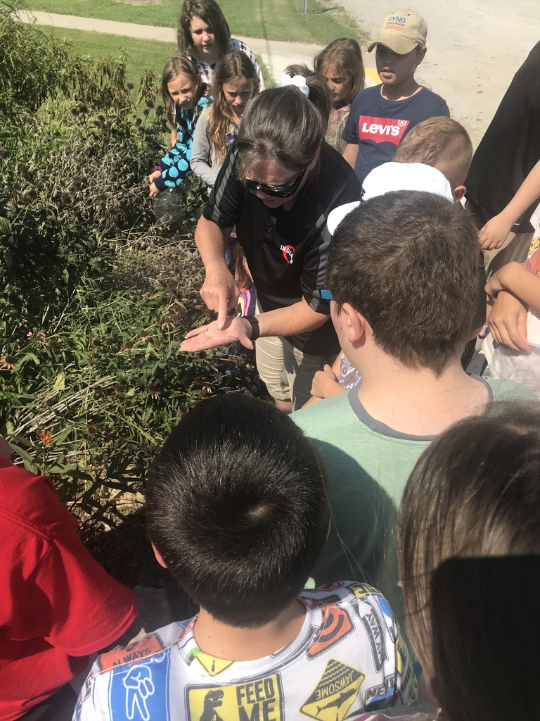 Mrs. Farris showing students seeds